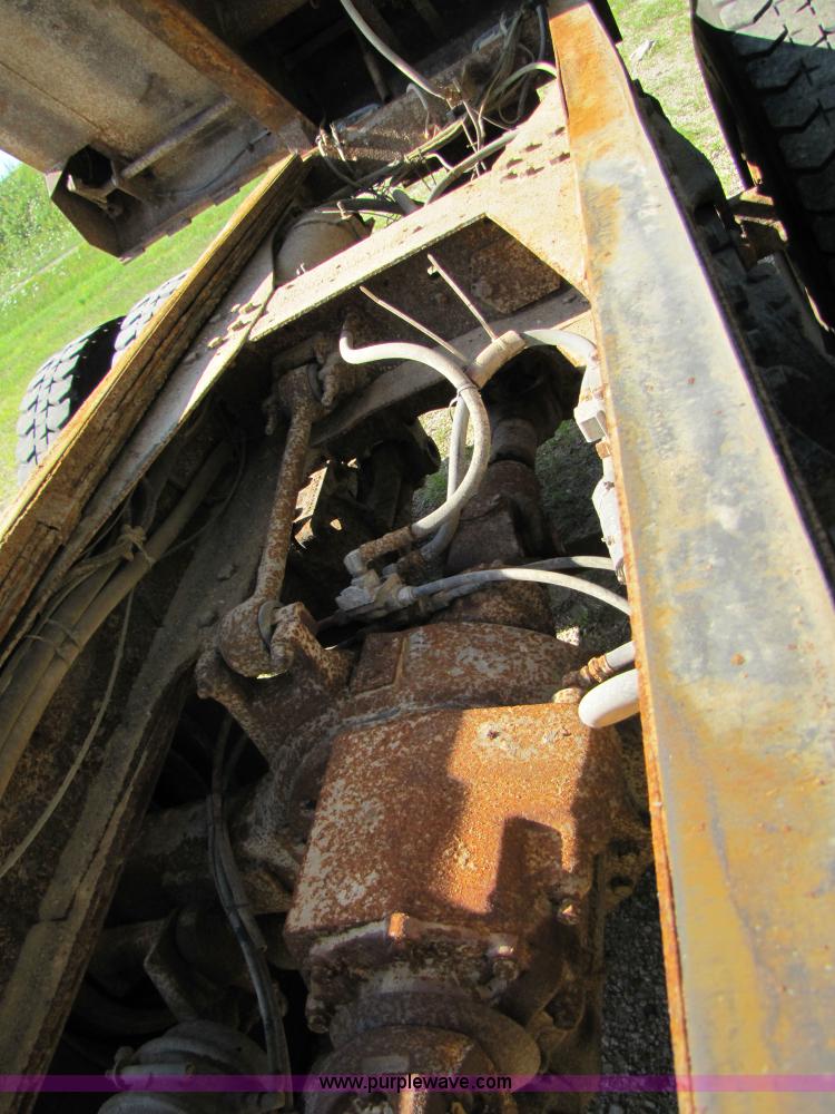 image for item 3610 1991 Ford L9000 dump truck with side snow plow