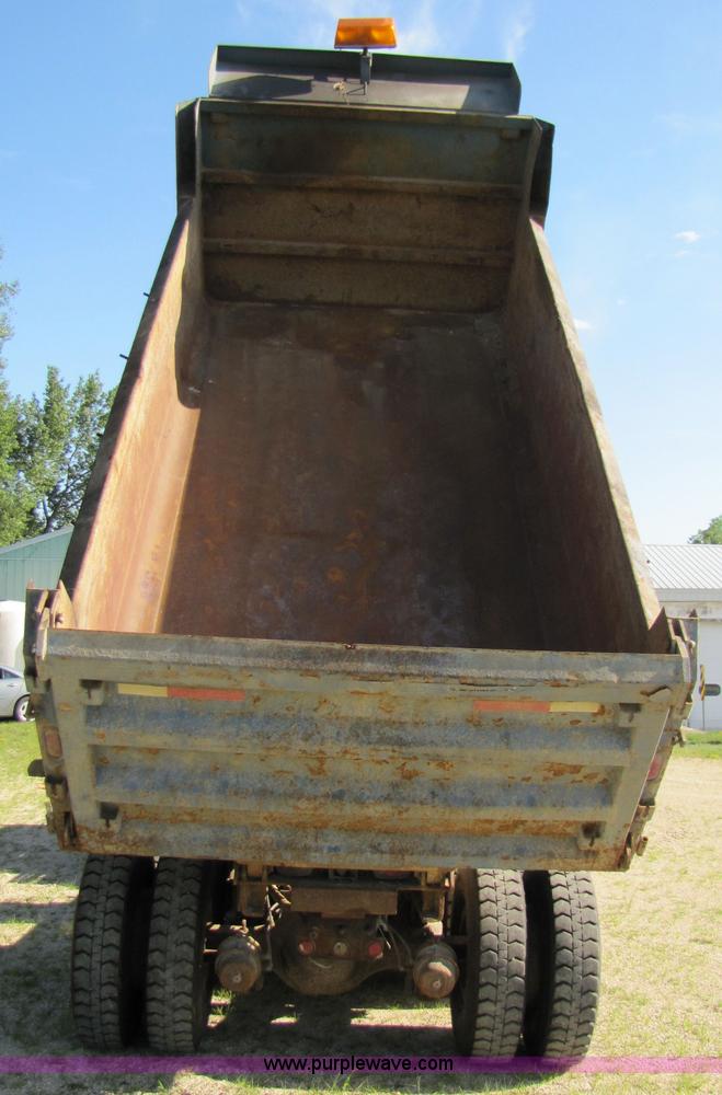 image for item 3610 1991 Ford L9000 dump truck with side snow plow