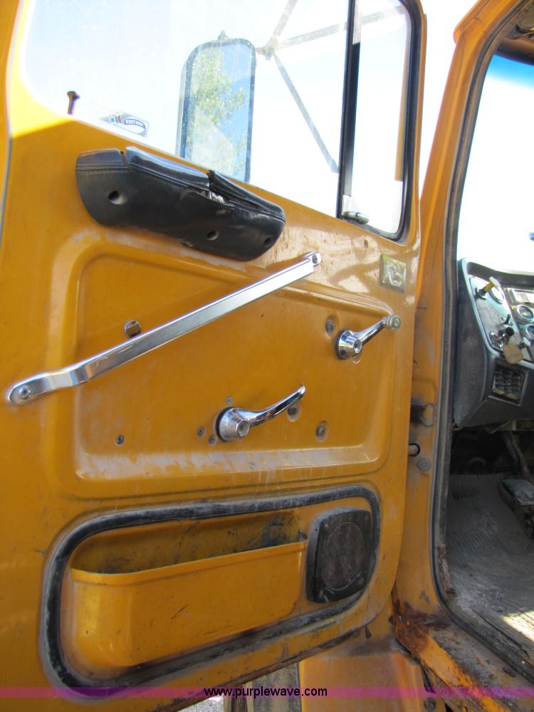 image for item 3610 1991 Ford L9000 dump truck with side snow plow