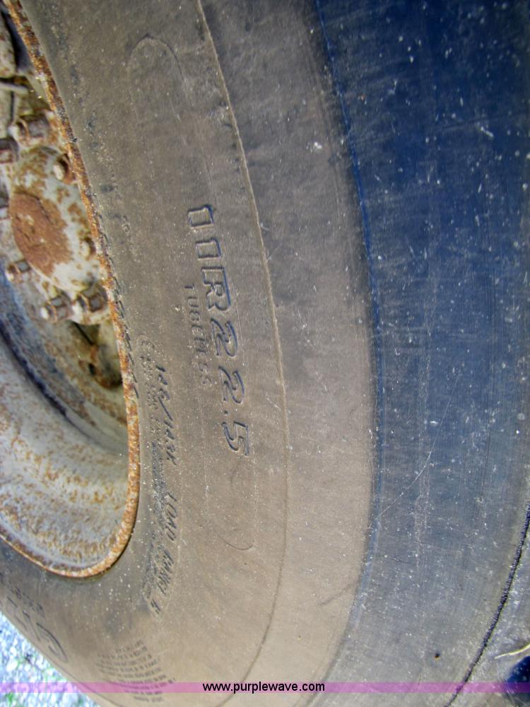 image for item 3610 1991 Ford L9000 dump truck with side snow plow