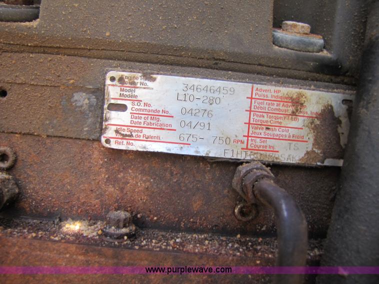 image for item 3610 1991 Ford L9000 dump truck with side snow plow