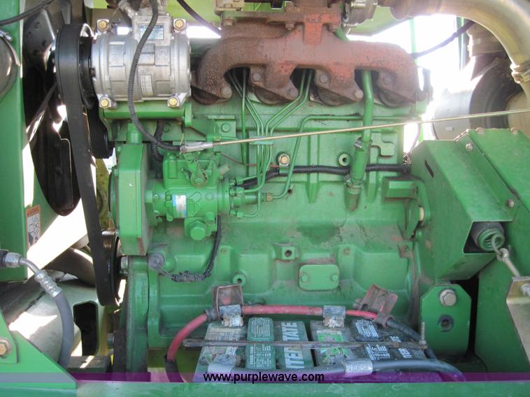 image for item 3017 2000 John Deere 4890 self-propelled swather