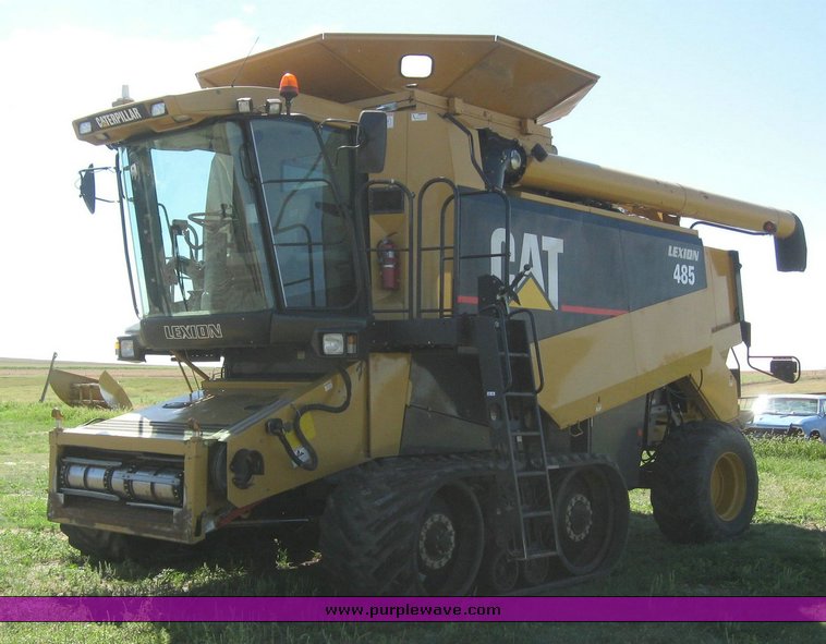 image for item 6135 2000 Caterpillar Lexion 485 combine