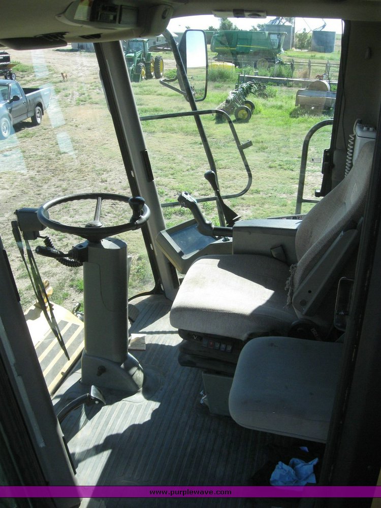 image for item 6135 2000 Caterpillar Lexion 485 combine