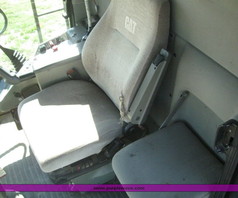 image for item 6135 2000 Caterpillar Lexion 485 combine