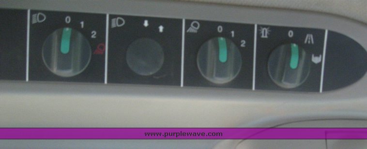 image for item 6135 2000 Caterpillar Lexion 485 combine