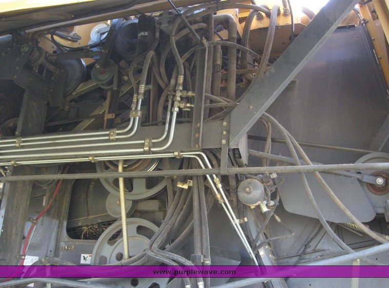 image for item 6135 2000 Caterpillar Lexion 485 combine