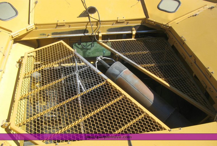 image for item 6135 2000 Caterpillar Lexion 485 combine