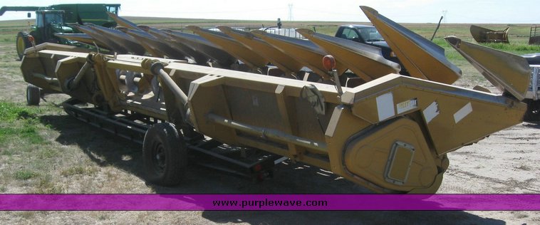 image for item 6137 Caterpillar Lexion 1230 12 row corn head