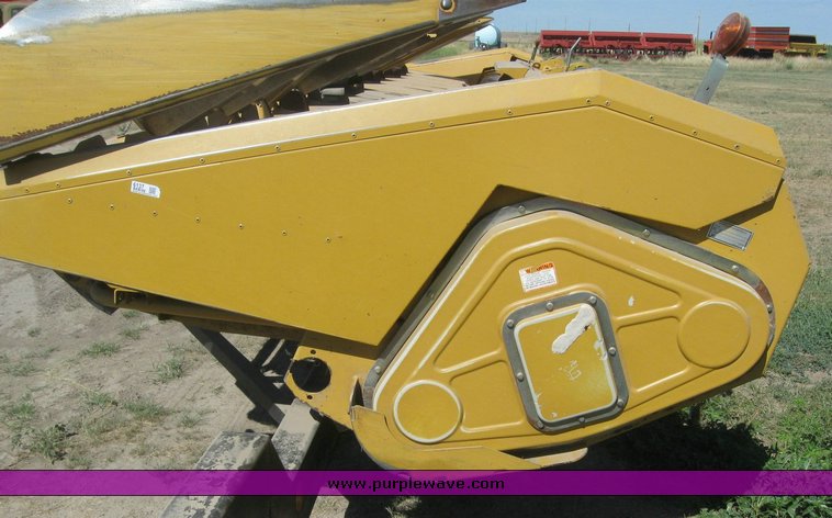 image for item 6137 Caterpillar Lexion 1230 12 row corn head