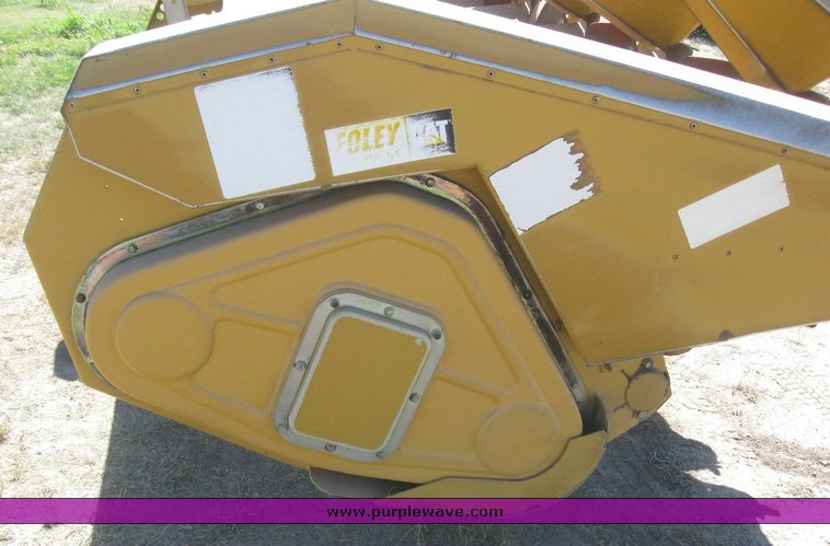 image for item 6137 Caterpillar Lexion 1230 12 row corn head