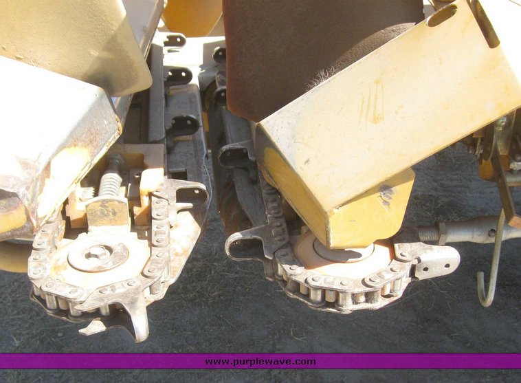 image for item 6137 Caterpillar Lexion 1230 12 row corn head