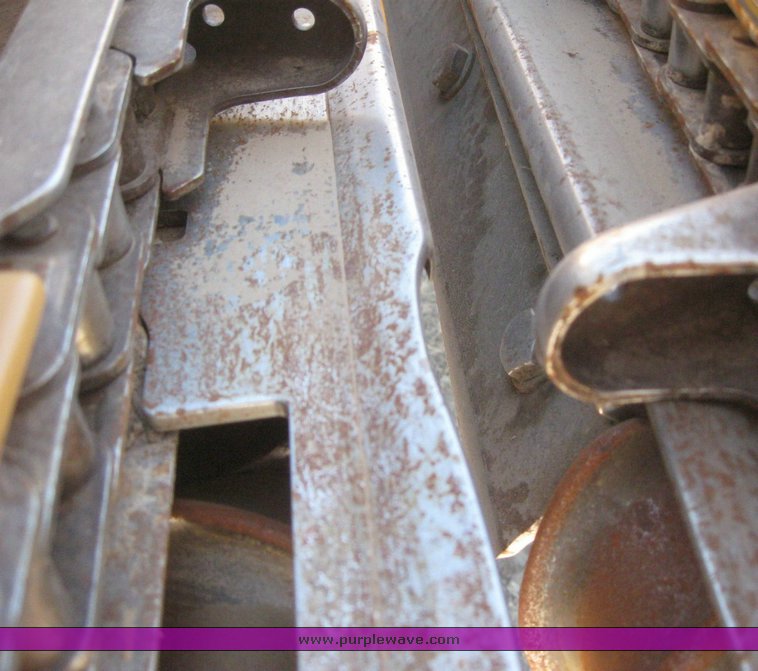 image for item 6137 Caterpillar Lexion 1230 12 row corn head