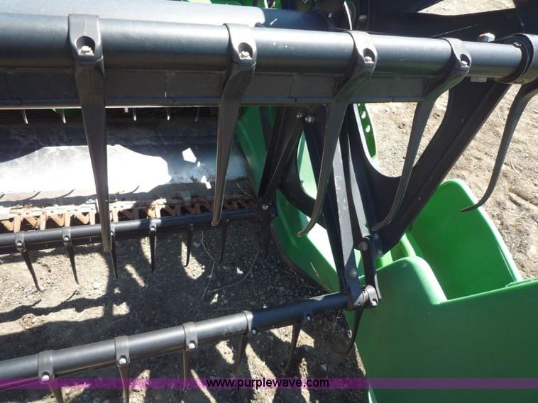 image for item 7004 1998 John Deere 930F flex platform