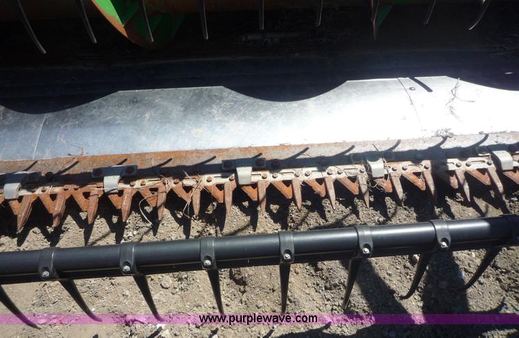 image for item 7004 1998 John Deere 930F flex platform