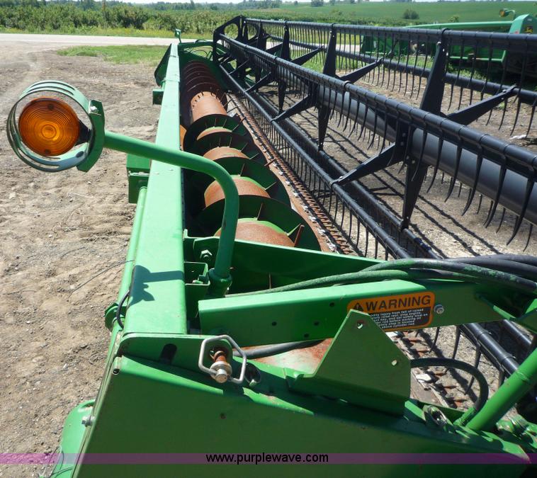 image for item 7004 1998 John Deere 930F flex platform