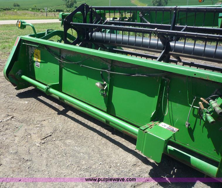 image for item 7004 1998 John Deere 930F flex platform