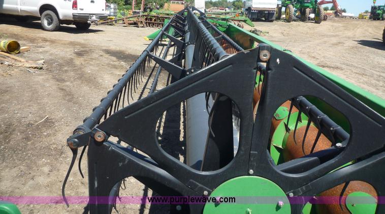 image for item 7004 1998 John Deere 930F flex platform