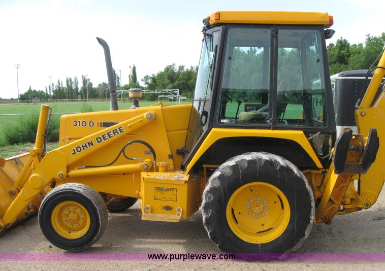 image for item 2045 1992 John Deere 310D back hoe