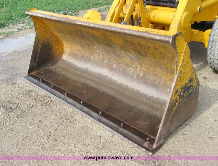 image for item 2045 1992 John Deere 310D back hoe