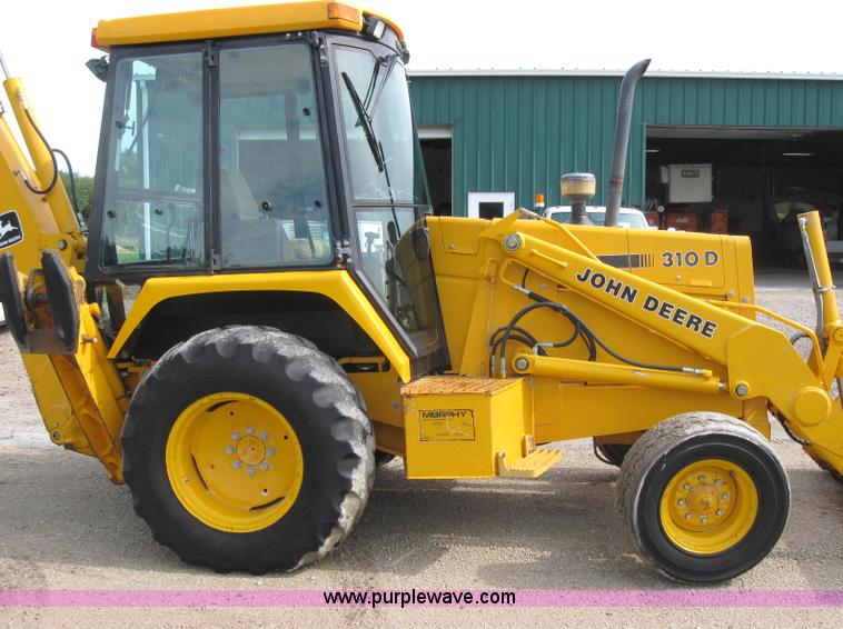 image for item 2045 1992 John Deere 310D back hoe