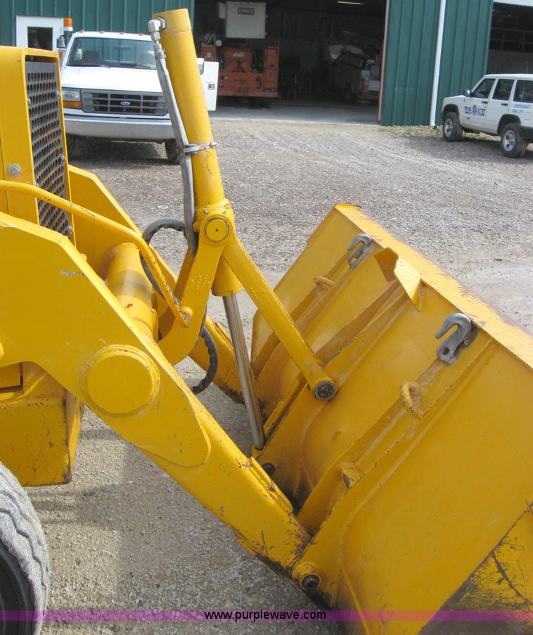 image for item 2045 1992 John Deere 310D back hoe