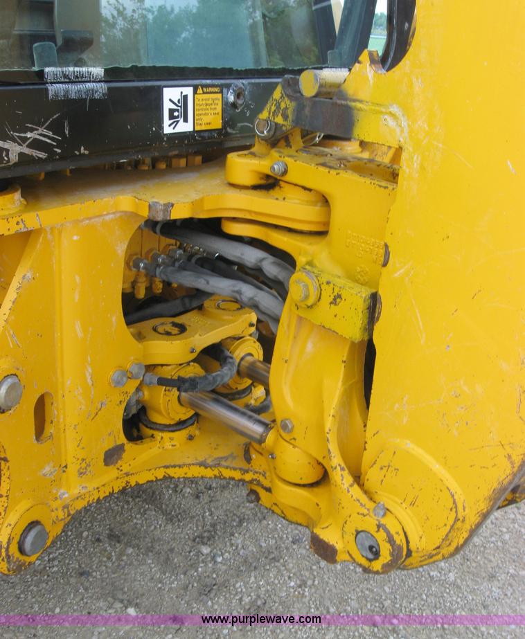 image for item 2045 1992 John Deere 310D back hoe