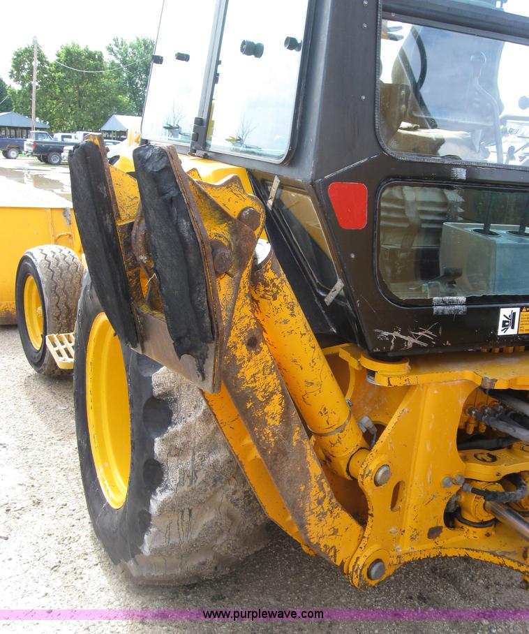 image for item 2045 1992 John Deere 310D back hoe