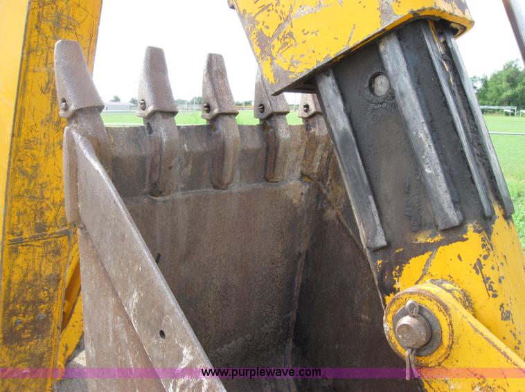 image for item 2045 1992 John Deere 310D back hoe