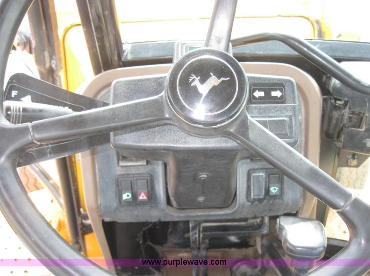 image for item 2045 1992 John Deere 310D back hoe