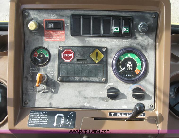 image for item 2045 1992 John Deere 310D back hoe