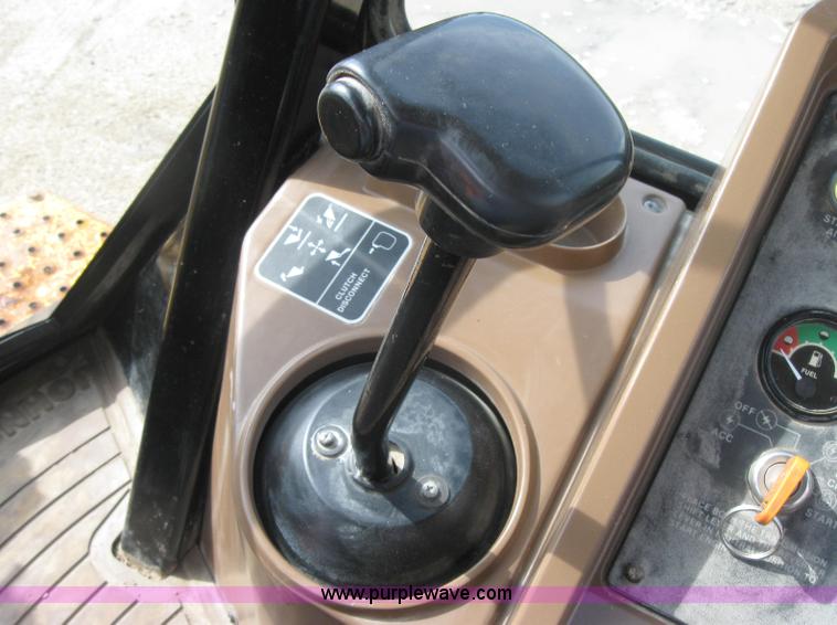 image for item 2045 1992 John Deere 310D back hoe