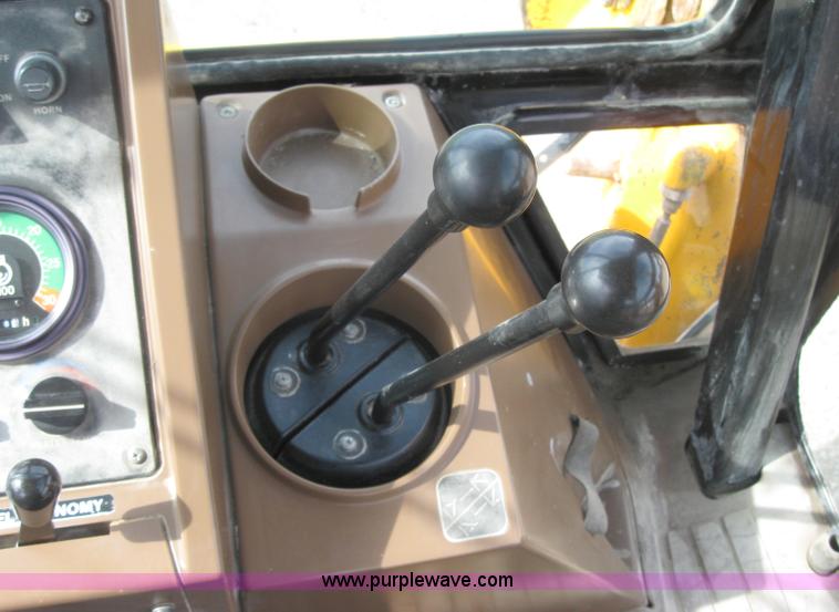 image for item 2045 1992 John Deere 310D back hoe