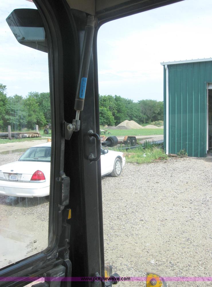 image for item 2045 1992 John Deere 310D back hoe