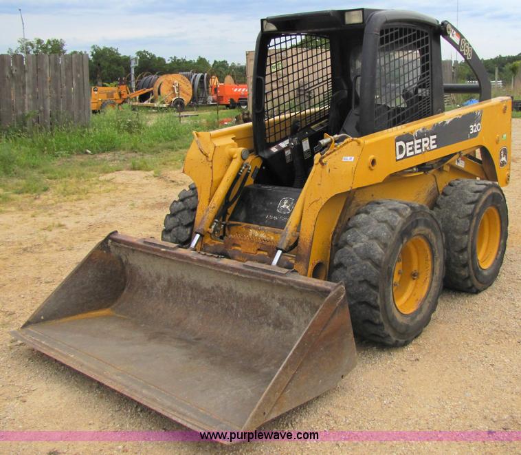 image for item 2311 2005 John Deere 320 skid steer