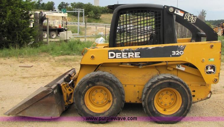 image for item 2311 2005 John Deere 320 skid steer