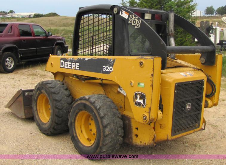 image for item 2311 2005 John Deere 320 skid steer