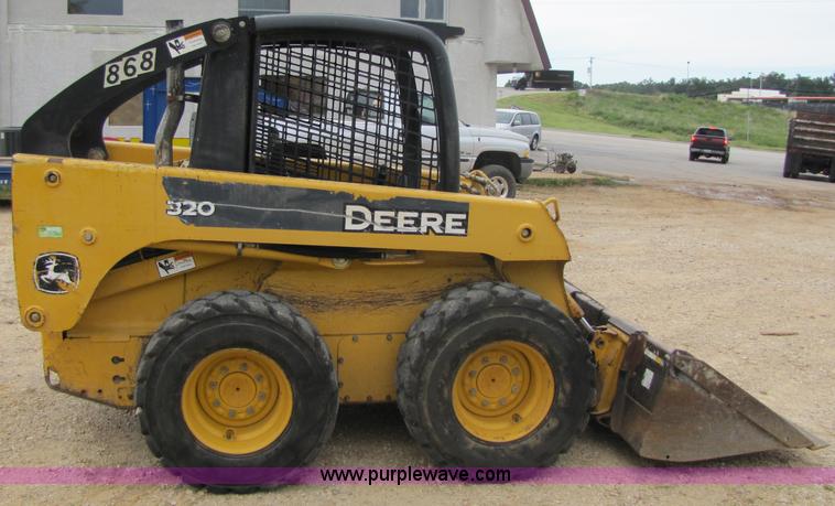 image for item 2311 2005 John Deere 320 skid steer