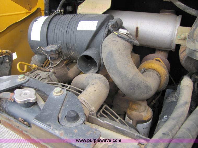 image for item 2311 2005 John Deere 320 skid steer