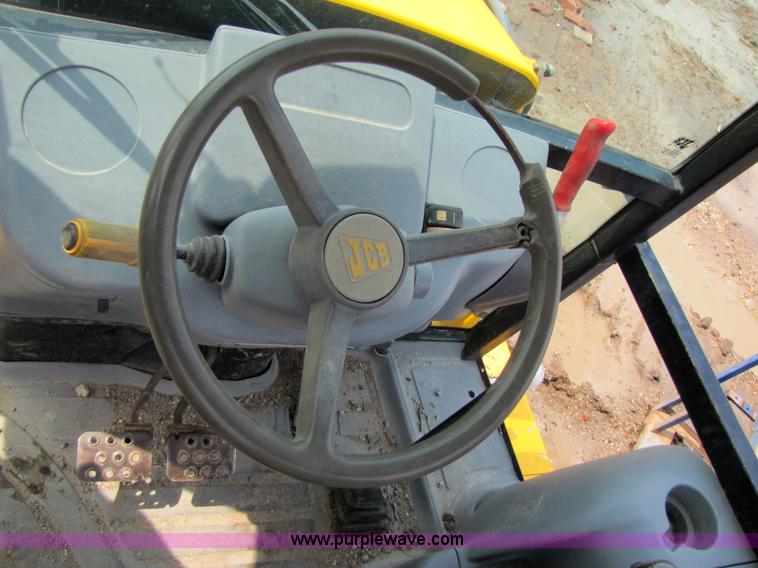 image for item 3064 JCB 214E backhoe