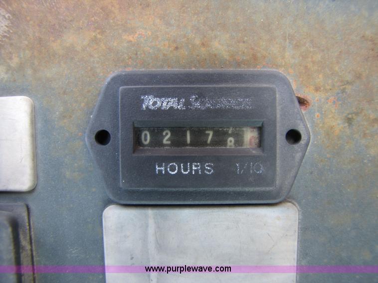 image for item 3064 JCB 214E backhoe