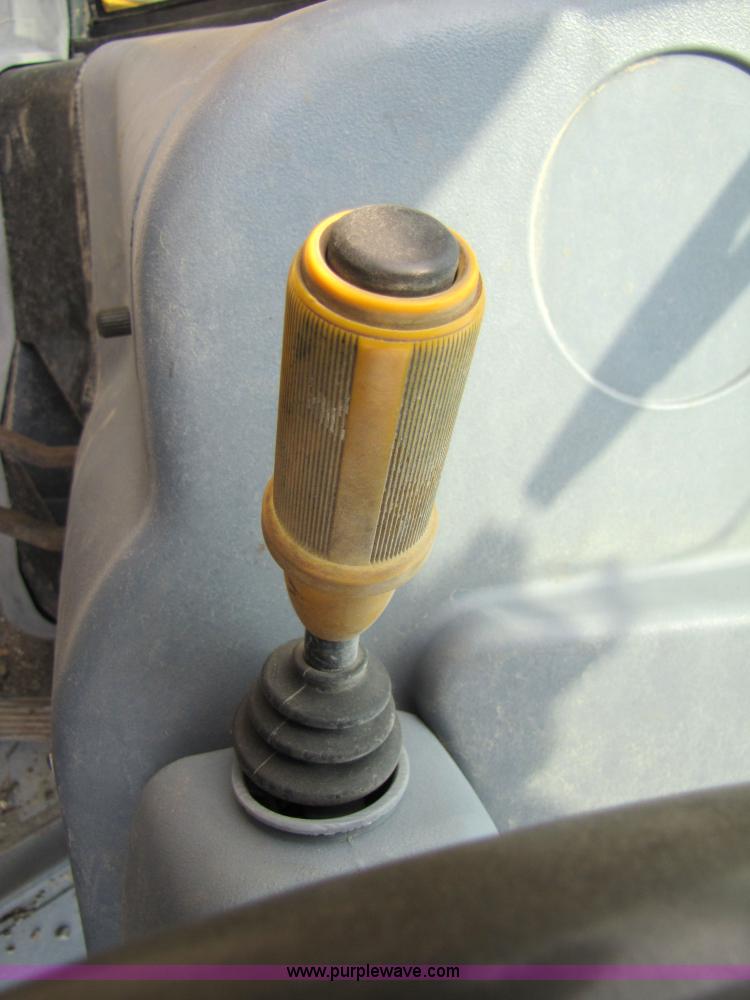 image for item 3064 JCB 214E backhoe