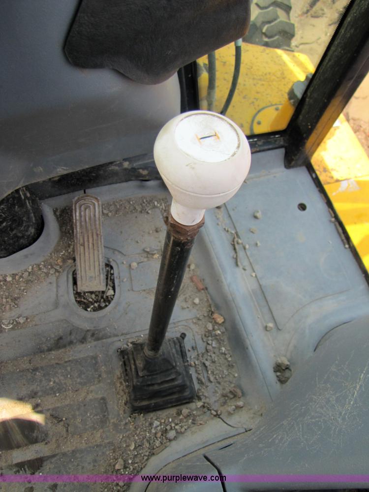 image for item 3064 JCB 214E backhoe