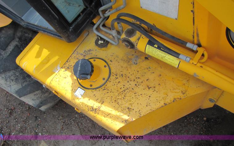 image for item 3064 JCB 214E backhoe