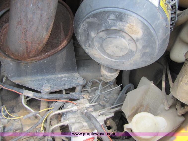 image for item 3064 JCB 214E backhoe