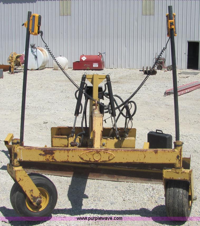 image for item 4736 Ariens 8' grader skid steer attachment