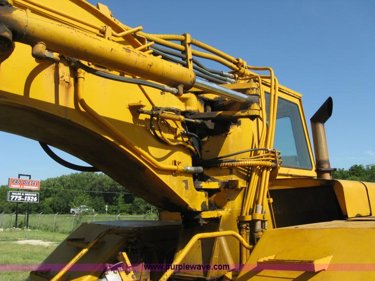 image for item 5046 1976 John Deere 762 paddle scraper