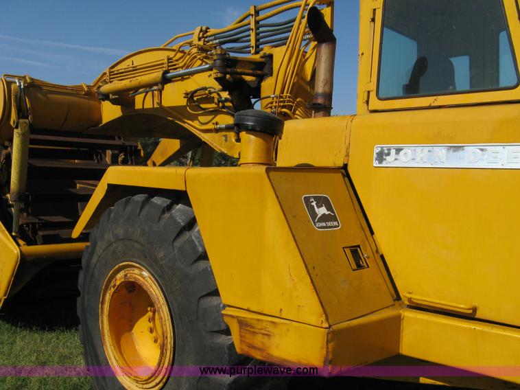 image for item 5046 1976 John Deere 762 paddle scraper