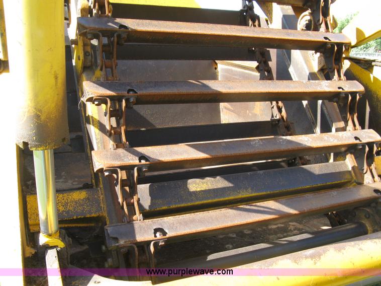 image for item 5046 1976 John Deere 762 paddle scraper