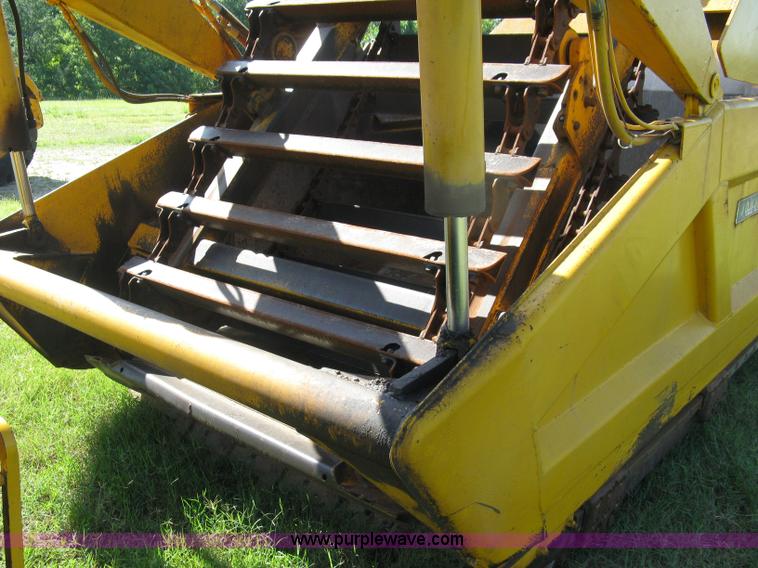 image for item 5046 1976 John Deere 762 paddle scraper